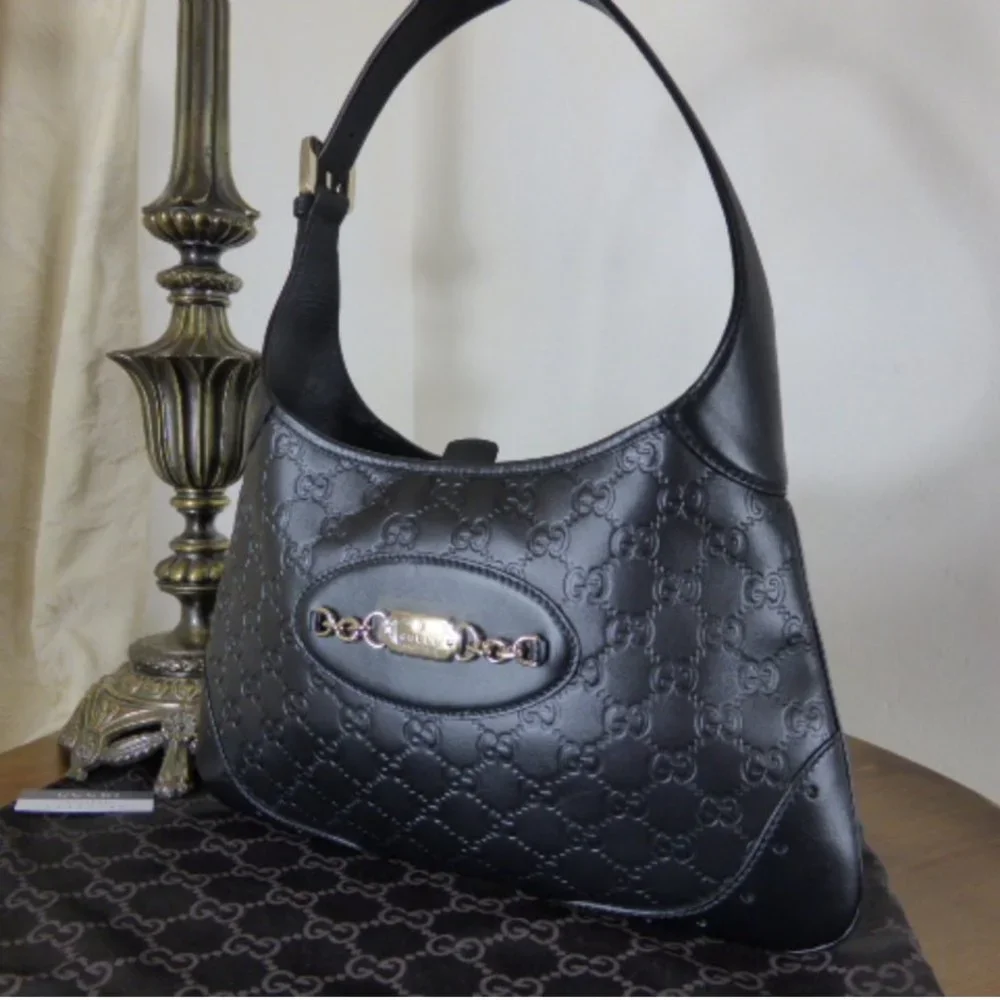 Auc GUCCI Guccissima Leather Punch Hobo Black